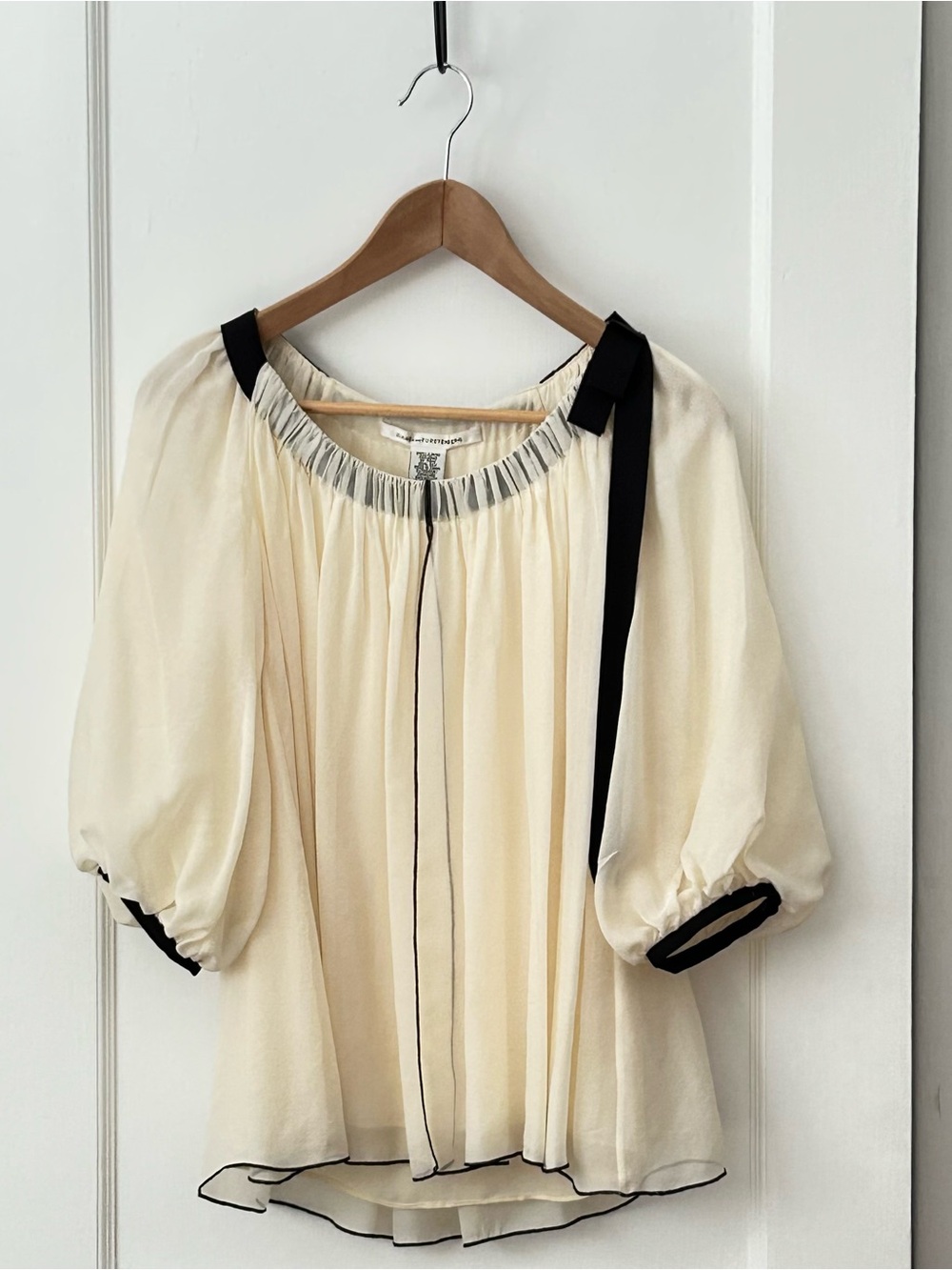 Diane Von Furstenberg 100% Silk, Fully Lined Cream Blouse with Black Ribbon Trim